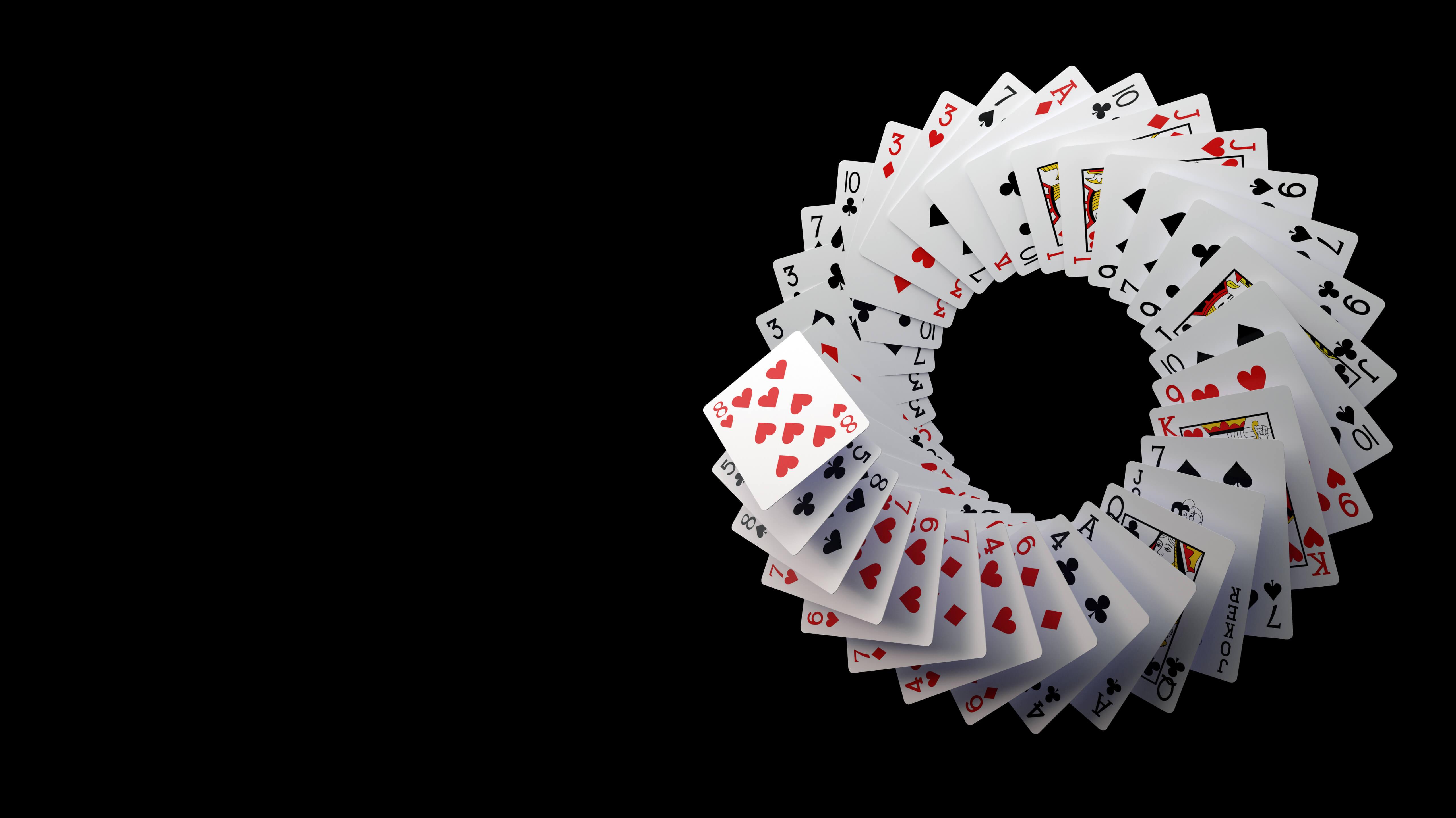 Image of playing cards in a swirling circle pattern, representing the coupon collectors problem. Uniformity is an important concept for baseball card collectors and molecular biologists. 