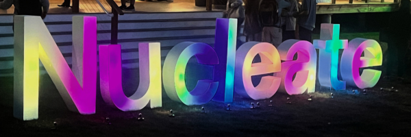 Large, multicolored letters spell out "Nucleate" outside the Nucleate Summit. 